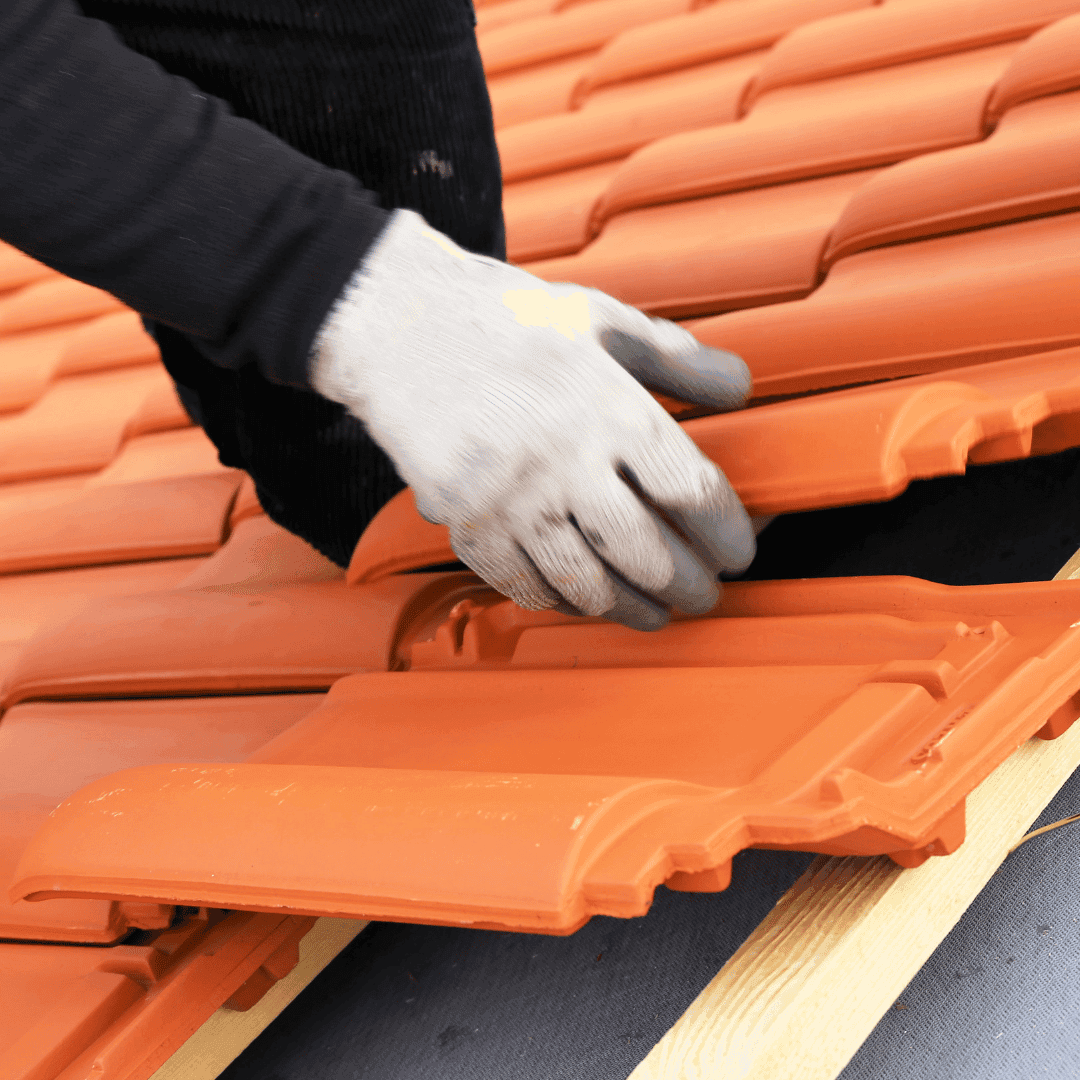 Roofer installing roofing on a Crewe home