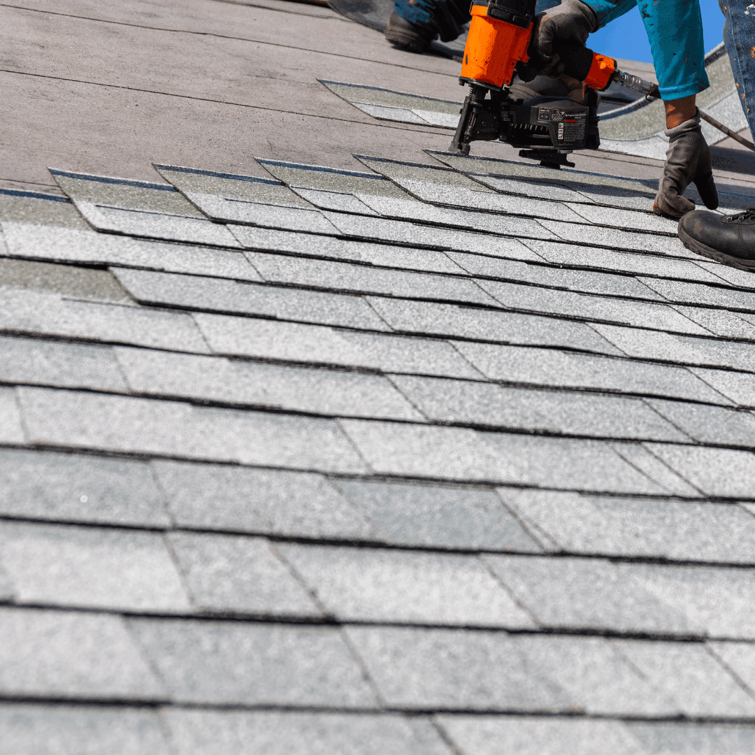 Crewe roofers performing maintenance on a residential roof